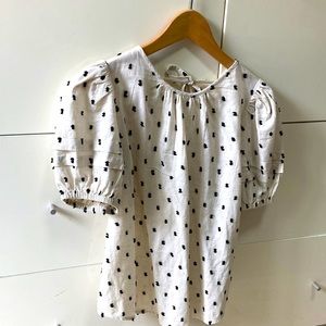 Barely worn Madewell top with cute cut out back and puff sleeve.